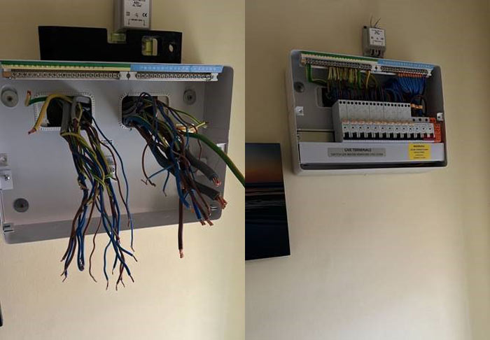 Wiring termination box with exposed and connected wires, mounted on a wall, showcasing electrical connections and circuit components.